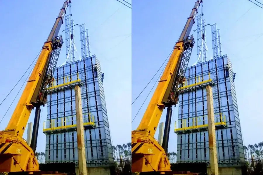 Guindaste Gerizim em serviço de transporte de máquinas pesadas